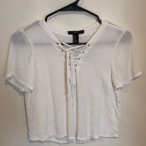 T shirt with cris cross and tie in the front